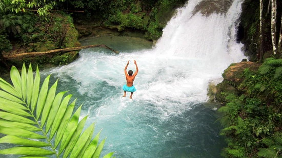 Vibrant blue agoons of Blue Hole Secret Falls in Jamaica