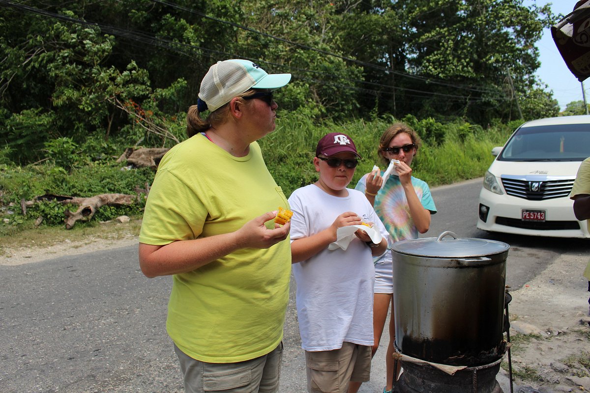 Guests enjoying street side cooking